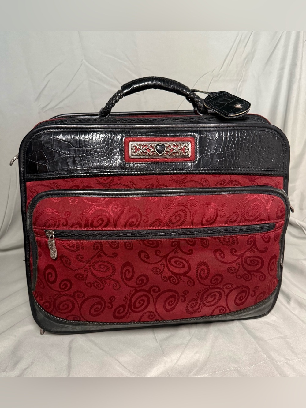 Vintage Brighton rolling luggage bag